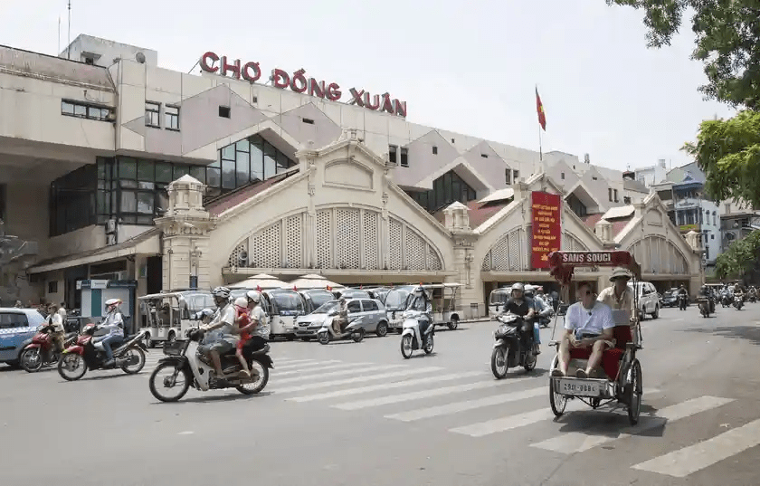 Go to Dong Xuan market