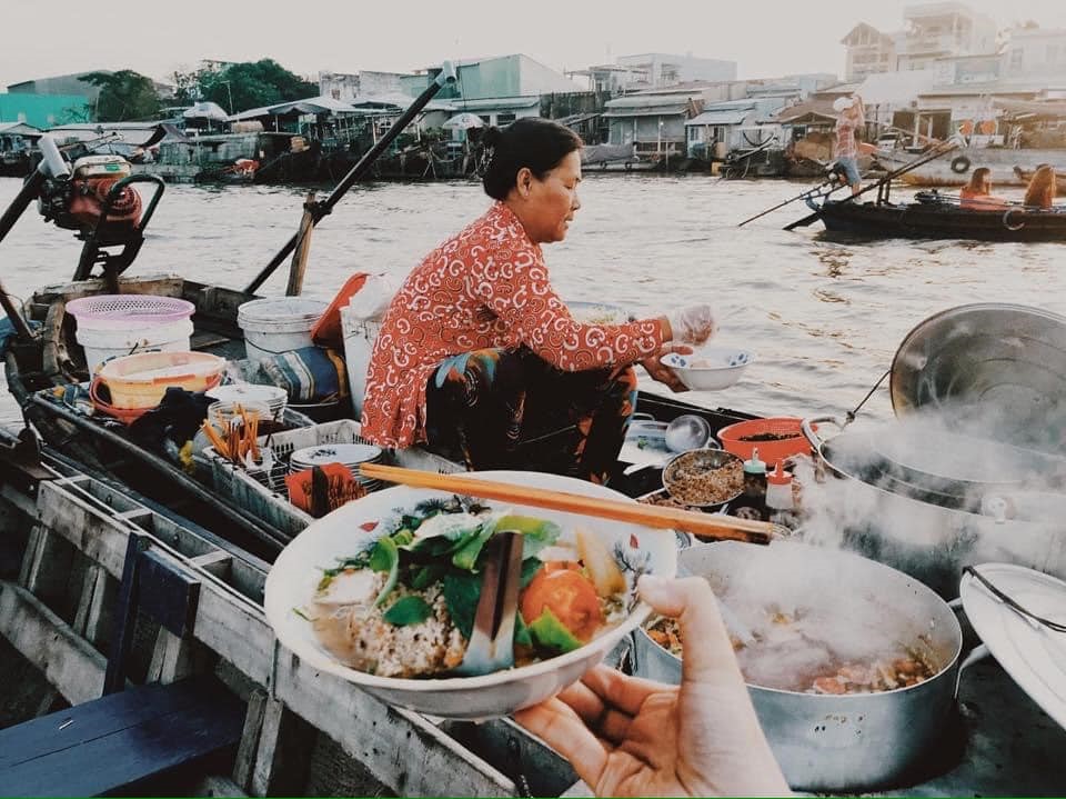 Enjoy a bowl of bun rieu at Cai Rang Floating Market