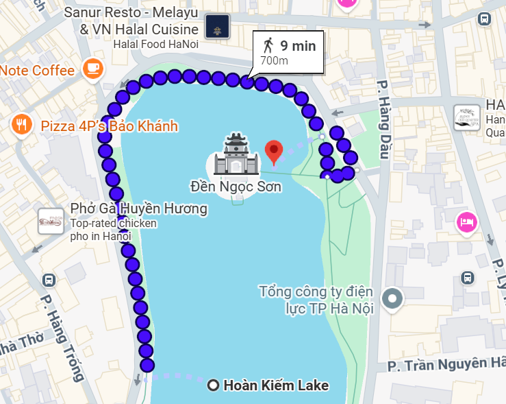 Walking to The Huc Bridge from Hoan Kiem Lake